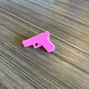 Pink 3D printed Glock croc charm